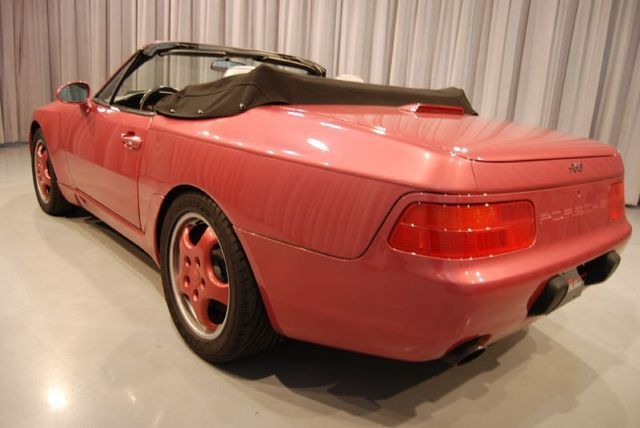  This 1993 Porsche 968 Cabriolet is finished in the rare Raspberry Metallic 